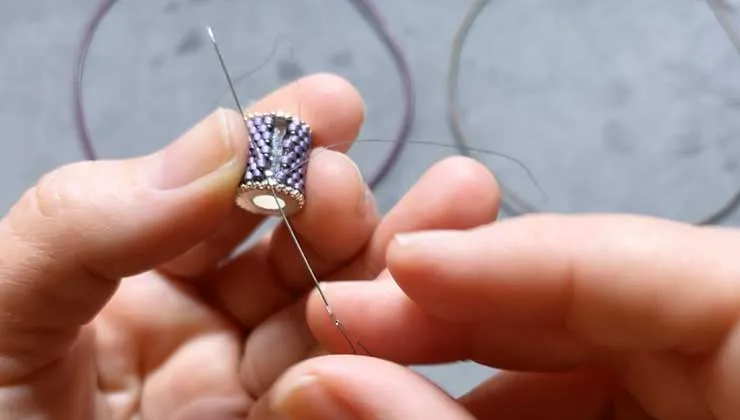 How to Add Peyote Bead Weaving to a Channel Bead and Finish on a Leather Necklace